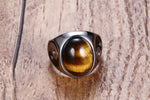 Oval tiger's eye signet ring with yin-yang shoulders, stainless steel — VoxArcana